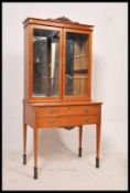 Edwardian Queen Anne revival satin birch bookcase display cabinet on stand. Square tapered legs with