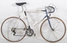 A retro 1980's Raleigh Equipe (mens) bike, complete with original pump and water bottle.