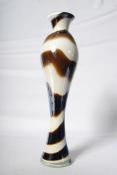 A Juliana glass vase with chocolate swirl pattern. 49cm tall.