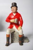 An Aynsley porcelain model of a huntsman 'The Fox Hunter' from the Sporting Characters' series.