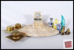 Three assorted desktop inkwells, five pottery and metal miniature vases and a pair of decorative