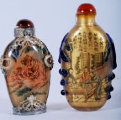 Two Chinese 1960's glass snuff bottles, the interior handpainted having glass overlay and finished