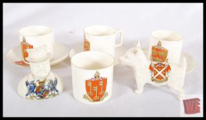 A collection of nine crested ware pieces including Goss.