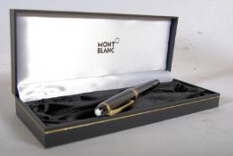 A Mont Blanc Meisterstruck fountain pen in original case and original Mont Blanc ink. Serial