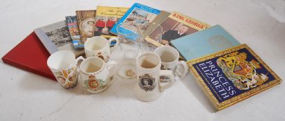 A collection of Royal ephemera and commemorative wares to include several books on Royal topics