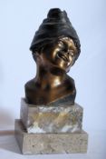 Aurisicchio, Vicenzo, Italy (1855-1926) Bronze Bust of a young peasant girl in traditional hat.