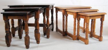 A golden oak graduating nest of tables together with a dark oak nest of tables The turned legs