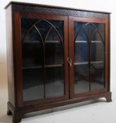 Edwardian solid mahogany library bookcase display cabinet. Swept ogee bracket legs on plinth