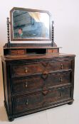 1930's Jacobean revival oak dressing chest of drawers. The bun feet supporting a low chest having