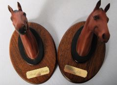 Two Beswick horse head wall plaques of Red rum and Arkle.