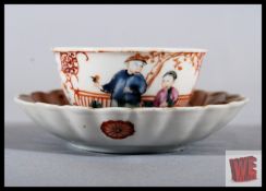 An 18th century Chinese porcelain tea bowl and saucer