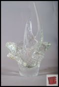 A decorative 20th century control bubble studio glass vase in the form of a basket. 19cm tall.