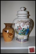 A large Chinese Famille Rose ginger jar with Chinese writing and stamp together with a decorative
