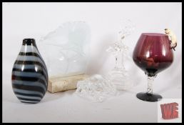 A collection of glassware to include a ballerina on plinth, brandy glass, cat and 2 mice, a studio