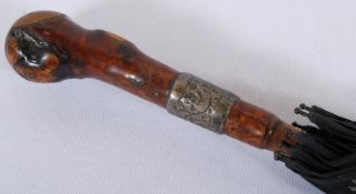 A vintage Edwardian gentlemans silver collar umbrella. The embossed silver collar on a burr walnut