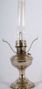 A 1950's chrome aladdin parafin lamp complete with glass flue with supports for an oversize shade