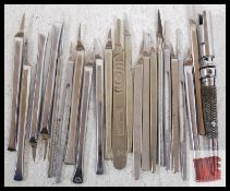 A collection of vintage scalpels including Scholl of London makes and many others
