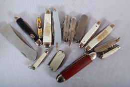 A collection of vintage and 20th century pen knives. Varying sizes and designs, some with mother