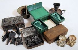 A mixed lot to include collectable pencil sharpeners, vintage tins, ink press set and others