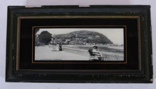 A Victorian framed black and white photograph of Minehead promenade, with glass surround. 18cm x