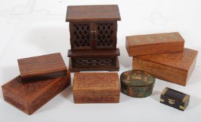 Six wooden boxes plus one musical cabinet and one Chinese papier mache box