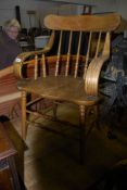 20th century American bentwood beech windsor chair. The turned legs with peripheral stretchers