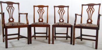 A set of 4 19th century Georgian mahogany chippendale revival dining chairs. The squared legs united