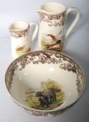 A Spode woodland pattern Brown Bear bowl and two jugs. Bowl 24cm diameter.