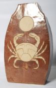 A Studio Pottery vase decorated with a crab and fruit. 33cm tall.