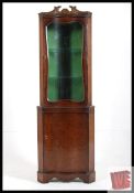 1930's burr walnut serpentine fronted corner display cabinet. Shaped glass with 2 glass shelves to