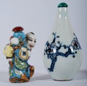 Two Chinese 1960's porcelain snuff / powder bottles,one having famille bleu decoration, the other