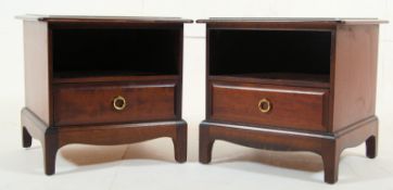 A pair of Stag 'Minstrel' mahogany bedside cabinets / tables. Squared legs with single drawers and