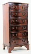 A Georgian mahogany serpentine tall bank / chest of drawers. H99cm x W48cm x D39cm