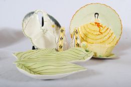 A Carltonware trefoil leaf dish together with a Burleigh ware trefoil dish, a pair of piazza ware