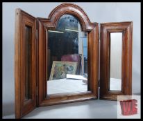 An antique style tripitch mirror together with a similar hanging mirror. 49cm x 67cm and 47cm x 35cm