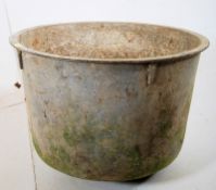 A mid 20th century large galvanised metal cauldron, ideal as garden planter. 46cms high x 55cms
