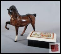 A Beswick trotting horse marked to base with a Wade Guinness trinket box, china plate from '