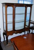 Edwardian bow front mahogany large display cabinet. Cabriole legs with 1 drawers to base having