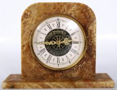 A retro Mercedes West German mantle clock having mechanised movement encased in Malta stone