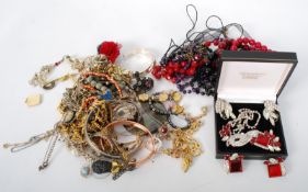 A good small quantity of costume jewellery to include bracelets, necklaces, pearls, beads,