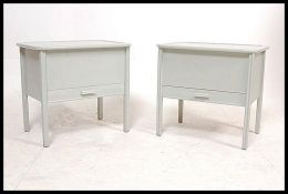 2 1950`s shabby chic French painted bedside table cabinets. Both with lined interiors under hinged