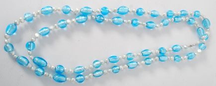 Freshwater pearls and murano glass beads