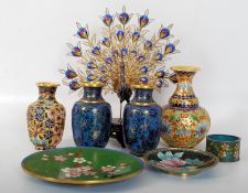 A cloisonne enamel brass peacock on a wooden plinth together with four enamel vases, two enamel