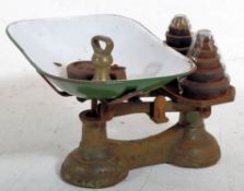 A vintage `To Weigh` cast iron grocers / industrial scales complete with metric and imperial