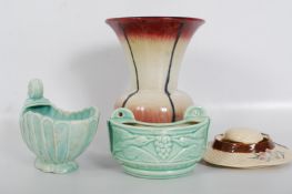 Four early ceramic pieces to include a German vase, Burleigh ware wall pocket, Kensington Shell