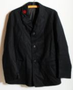 An original GWR railway station coat / wool jacket. The collar bearing a red stiched logo.