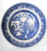 A Royal Doulton willow pattern bowl, with markings to base.