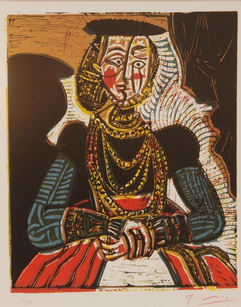 HAND SIGNED LITHOGRAPH OF WOMAN AFTER PICASSOHand signed lithograph depicting a seated woman after
