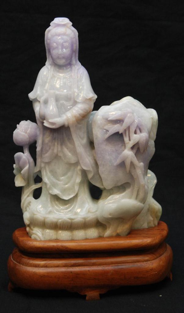 CHINESE CARVED JADEITE QUAN YIN FIGURE ON BASEChinese carved jadeite sculpture depicting a