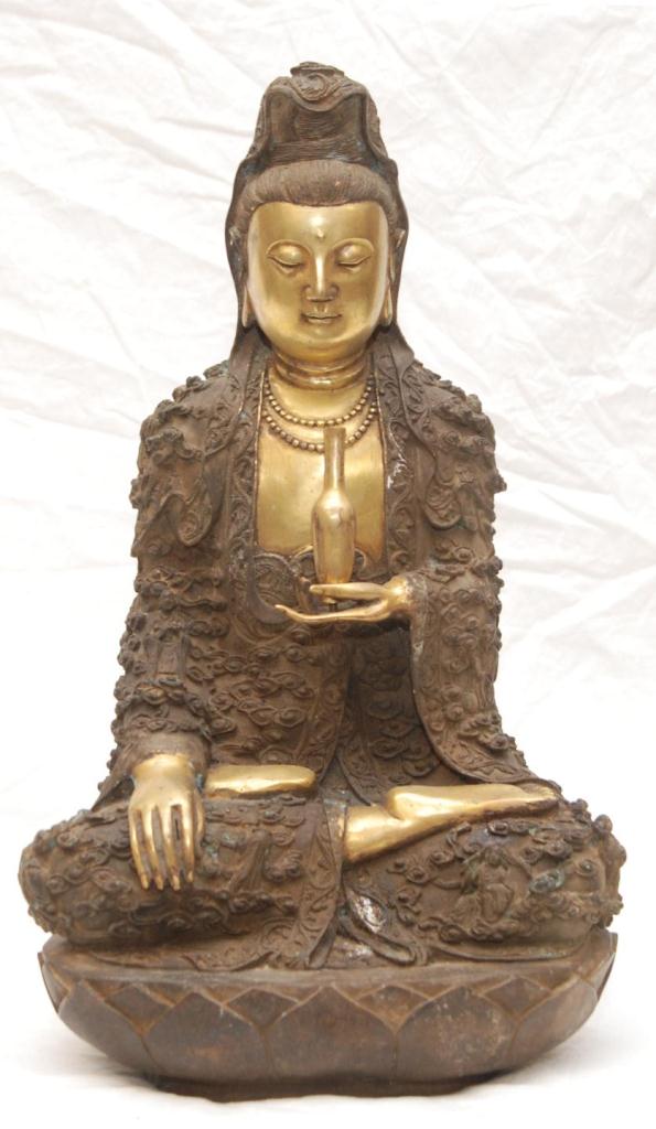 CHINESE GILDED BRONZE SEATED QUAN YIN FIGUREChinese hand crafted bronze figure depicting a seated